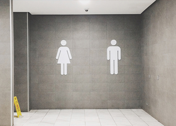 Male and female bathroom signs in Tampa, FL
