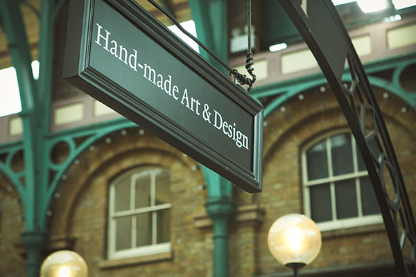 Elevate Your Business with Custom Hanging Signs: A Guide to Outdoor Signage Solution