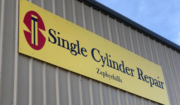 Large outdoor sign of Single Cylinder Repair in Zephyrhills